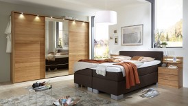 Schwebeturenschrank Eiche teilmassiv mit Grenoble in Kixx braun Titelbild web